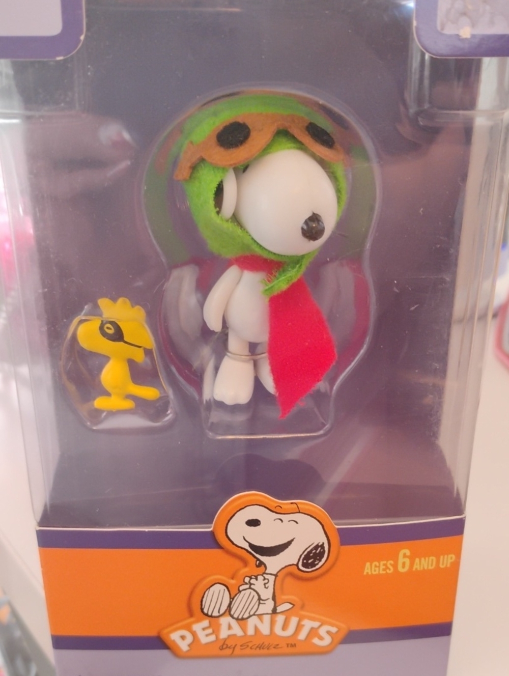 Peanuts Snoopy Figure with Green Aviator Hat and Red Scarf With Woodstock